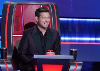 Michael Bublé smiles as he watches the Battle Rounds on