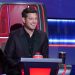 Michael Bublé smiles as he watches the Battle Rounds on